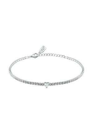 Bracelet de tennis en argent avec de petites pierres claires rondes et une pierre claire centrale en forme de cœur, avec un fermoir mousqueton et une chaîne réglable.