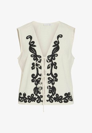 Hvitt ermeløst vester med dyp V-hals og svart blomsterbroderi langs forkantene, bundet med to hvite snorbånd.