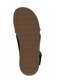 Černé sandály s texturovanou hnědou podrážkou. Obsahují nastavitelné pásky, zaoblený tvar a embosované logo CAPRICE na stélce. Velikost 37.