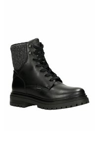 Schwarze Leder-Ankle-Boots mit einem Kunstwollkragen, Schnürdesign, abgerundeter Zehenform und strukturierten Gummisohlen. Mit silbernen Ösen und minimaler Markenpräsenz.