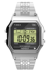 Digital watch with a silver stainless steel band, octagonal silver case, black face, green digital display, and INDIGLO backlight feature.