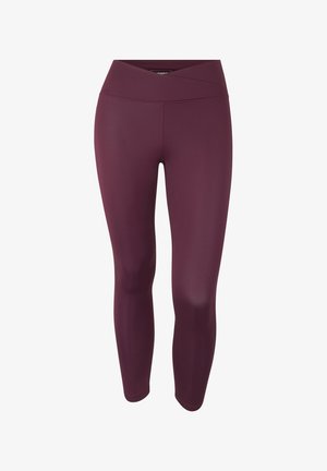 Leggings burdeos con una cintura alta. Fabricados con un material elástico, con una textura suave y un diseño ajustado.