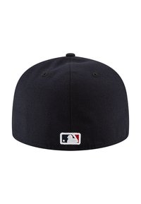 Black baseball cap with a rounded crown, featuring an embroidered MLB logo in white, red, and blue at the back.