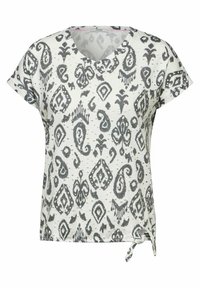 T-shirt blanc à manches courtes avec motif paisley gris, décolleté en V et détail de lien sur le côté. Tissu texturé avec de petits points en relief sur l'ensemble.