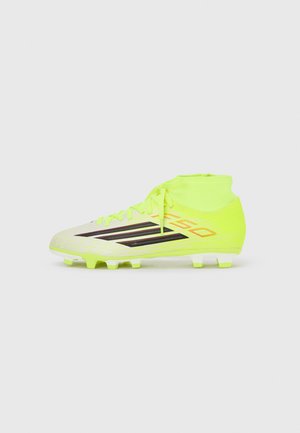 F50 CLUB MID UNISEX - Botines de fútbol para terreno firme - solar yellow/core black/lucid red