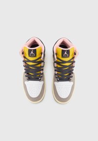 High-top sneakers with a white leather toe, gray suede overlay, yellow fabric tongue, pink collar, and dark gray laces.