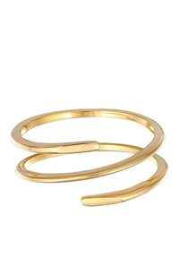 Guldfarvet metal cuff armbånd med et minimalistisk spiraldesign. Den glatte tekstur, de tilspidsede ender og den polerede overflade fremhæver dens elegante form.