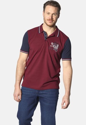 Bordeaux-rot und marineblaues Polohemd, aus Baumwollmischung, mit Kragen, Drei-Knopf-Leiste und gesticktem Grafikdesign auf der Brust. Kurze Ärmel mit Streifen.