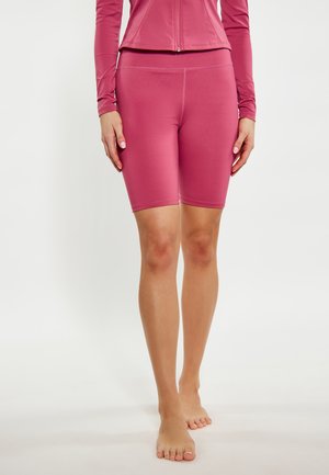 Fitted roze fietsbroekjes van glad rekbaar materiaal, met een brede tailleband en een lengte tot halverwege de dij voor een comfortabele fit.