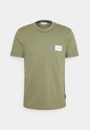 Olive green short-sleeve crew neck t-shirt with a small white Calvin Klein logo patch on the left chest.