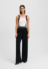 KARL LAGERFELD Jumpsuit white black/white Zalando