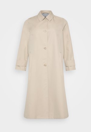 Beige trenchcoat met een recht model, knoopsluitingen en een kraag. Voorzien van zijzakken en omgeslagen mouwen. Glad textuur.