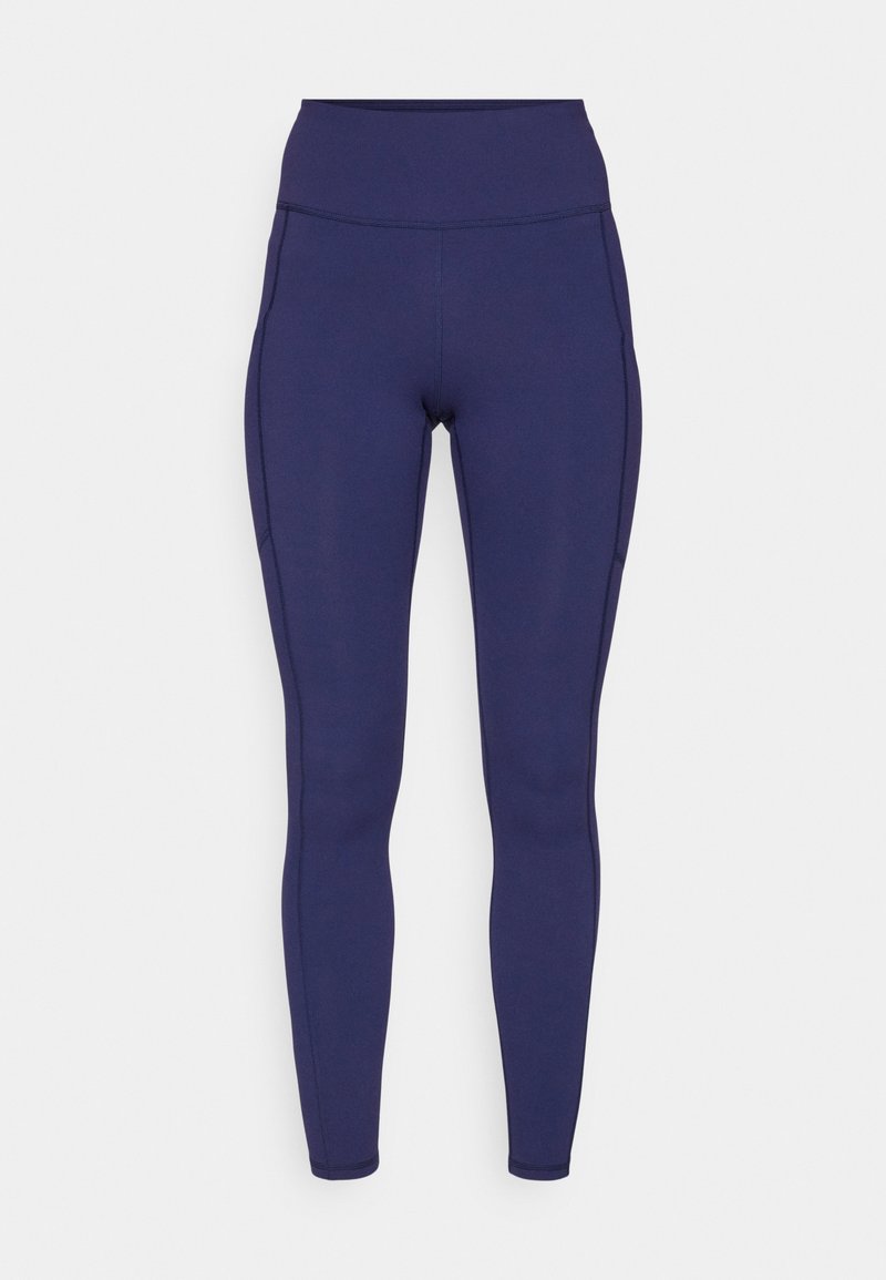 Marineblaue High-Waist-Leggings aus dehnbarem Stoff. Mit flachen Nähten und enger Passform, ausgestattet mit zwei seitlichen Taschen zur Aufbewahrung.