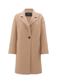 Manteau en laine couleur chameau avec un col cranté, fermeture à un bouton, et deux poches avant ; il présente une coupe structurée, droite et des manches décontractées.