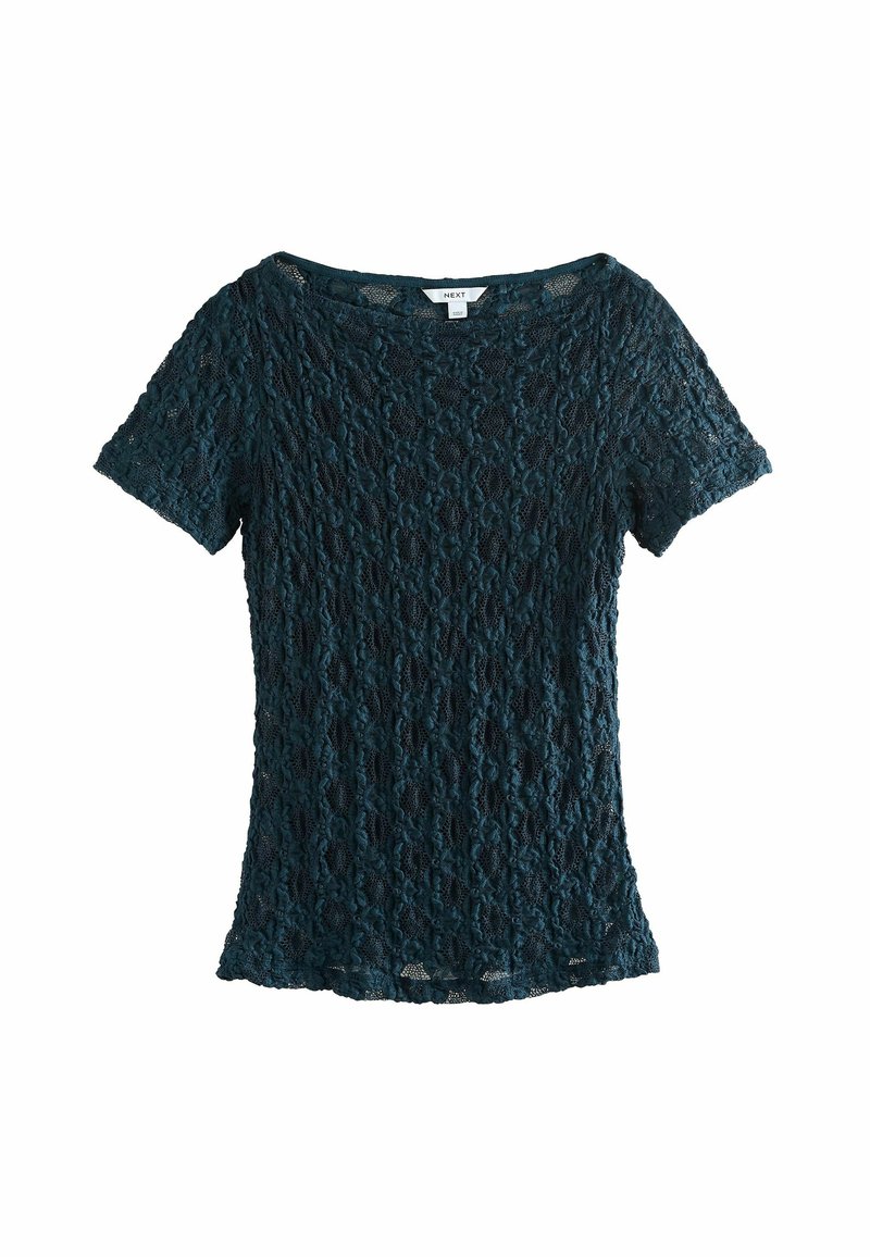 Haut en dentelle bleu sarcelle foncé à manches courtes avec motif floral et encolure ronde, taille petite, marque "NEXT."