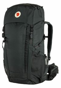 Black nylon backpack with a rounded top, adjustable straps, mesh side pockets, and a circular logo on the front. Features reinforced stitching.