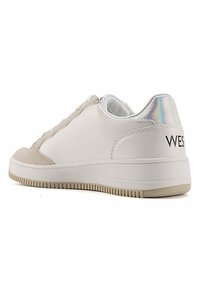 White and beige sneaker with a smooth leather upper, suede accents, and an iridescent heel featuring the word "WEST" in black. Rubber sole.