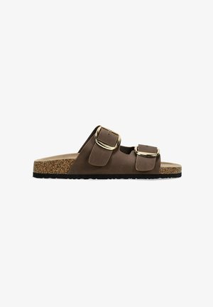 Sandalias marrones de mano con dos correas ajustables, hebillas metálicas, plantilla de corcho y suela de goma. Material superior suave.