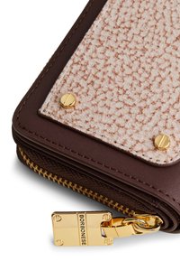 Brown leather wallet corner with textured beige fabric, gold-tone screws, and a gold zipper pull engraved with "BORBONESE."