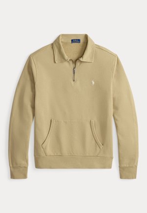 Huppari vaaleanbeige värissä, jossa on neljännesvetoketju kauluksessa, resorit hihansuissa ja etupuolella kengurun tasku. Rinnassa pieni brodeerattu logo.