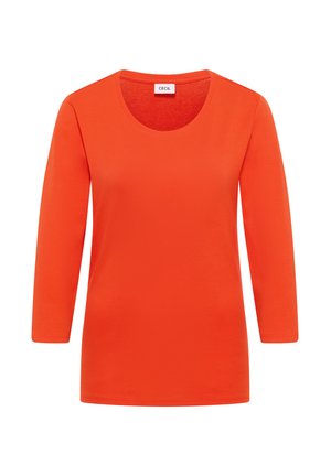 Orange langærmet T-shirt med rund hals, lavet af blødt materiale, med en glat tekstur og enkelt design. Brandlabel synlig ved halsen.