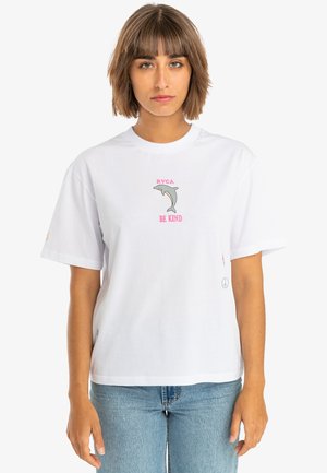 White cotton t-shirt with short sleeves, featuring a dolphin graphic and the phrase "BE KIND" in pink. Includes a peace symbol on the side.
