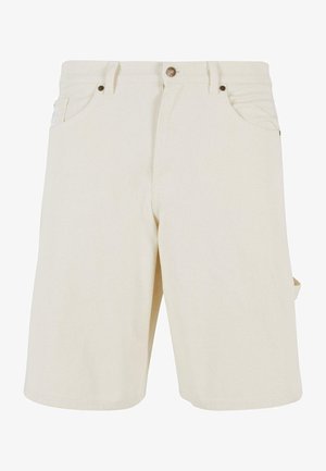 Jasno-beżowe szorty dżinsowe z szlufkami na pasek i przednimi kieszeniami. Posiadają metalowe zapięcie oraz dyskretną kieszeń boczną na narzędzia lub niezbędne drobiazgi.