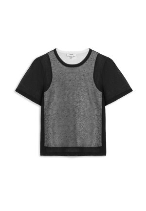 Top negro de manga corta con un panel frontal transparente con pequeños lunares y un escote redondo.