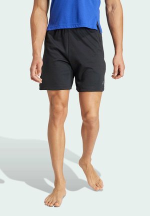 YOGA - Träningsshorts - black