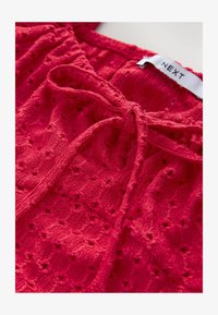 Selezionato, red
