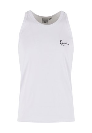 Valge puuvillane topp, millel on sooniline tekstuur; vasakul rinnal must brodeeritud logo. Klassikaline varrukateta disain.