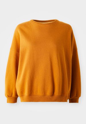 Orange sweatshirt with a round neckline, dropped shoulders, and ribbed cuffs. Soft texture with a slight speckled pattern throughout.