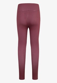 Leggins iz raztegljive tkanine v houndstooth vzorcu, z visokim pasom in oprijetimi gležnji v temno maročni barvi.