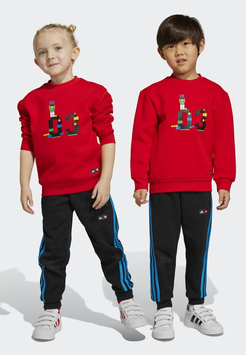 adidas Sportswear Tracksuit red /bright blue/red Zalando.co.uk
