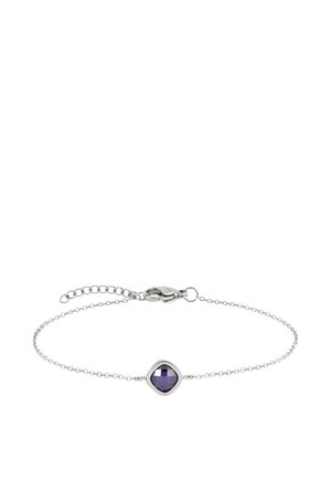 Delicate silver chain bracelet with a faceted square purple gemstone in the center and a lobster clasp with adjustable links.