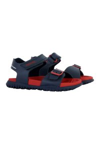 Sandalias para niños en azul marino y rojo. Fabricadas en goma con correas ajustables y una suela texturizada para mayor agarre. Presentan la marca Geox.