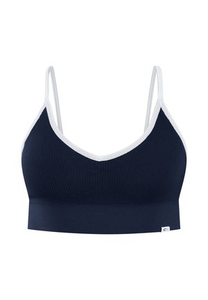 Bralette blu navy a coste con rifiniture bianche e spalline sottili, caratterizzato da una fascia elastica larga sul fondo e da una piccola etichetta sul bordo inferiore.