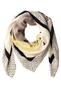 Foulard carré plié en boucle avec des couleurs beige, jaune et noir, présentant des motifs à pois et des rayures audacieuses.
