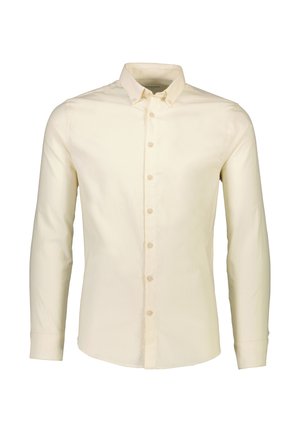 Pitkähihainen napillinen paita vaaleasta beigestä puuvillakankaasta. Ominaisuuksiin kuuluu klassinen kaulus, nappilista edessä ja mukautuva malli.