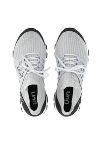 Light gray athletic shoes with a textured knit upper, black heel accent, white laces, and distinctive logo on the side and tongue.