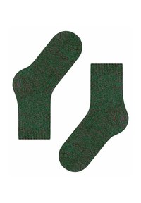 Zielone skarpetki z teksturowanym wzorem dzianiny, o długości do kostki i lekko zakrzywionym kształcie w okolicy kostki. Bogate, wielokolorowe włókna.