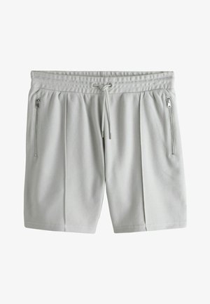 Light gray textured athletic shorts with elastic waistband, drawstring, and vertical zippered pockets on both sides.