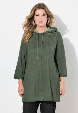 Green hoodie tunic with a loose fit, featuring a drawstring neckline and silver stud accents. Soft fabric and three-quarter sleeves.