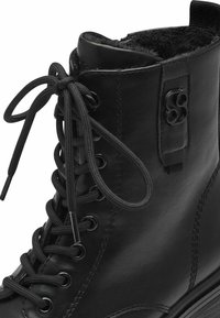 s.Oliver Bottes de neige - black