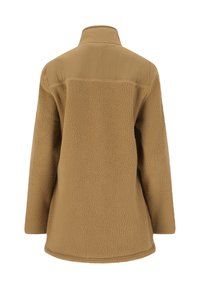 Beige Fleecejacke mit hohem Kragen, strukturiertem Stoff und geradem Schnitt. Ohne sichtbare Verschlüsse und mit einer glatten Rückseite.