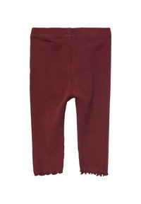 Leggings bordeaux côtelés avec une finition texturée, présentant une coupe ajustée et un ourlet festonné à la cheville. Tissu extensible pour plus de confort.