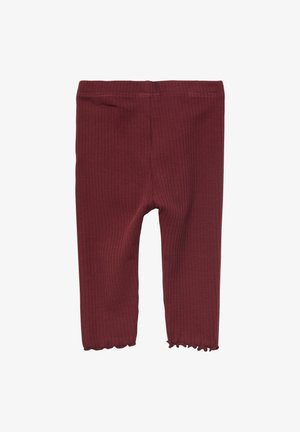 Bordeauxrode geribbelde legging met een gestructureerde afwerking, voorzien van een aansluitend ontwerp en gezoomd met een geschulpte rand bij de enkel. Rekbare stof voor comfort.