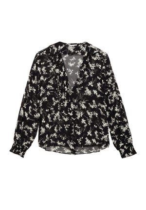 Blouse noire avec motif floral blanc, manches longues, devant boutonné et tissu doux et léger. Présente un col à empiècement et des poignets froncés.
