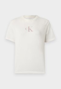 Balta īsroku kokvilnas T-krekls ar nelielu gaiši rozā "CK" logo uz krūtīm un klasisku apaļu kakla izgriezumu. Mīksta tekstūra.