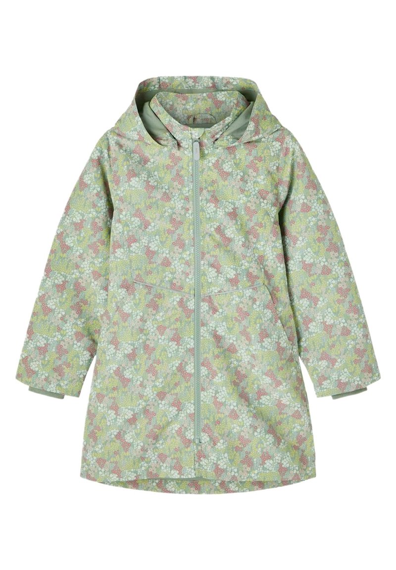 Veste de pluie à capuche vert clair avec un motif floral en rose, blanc et bleu. Dispose d'une fermeture éclair frontale et de deux poches latérales.